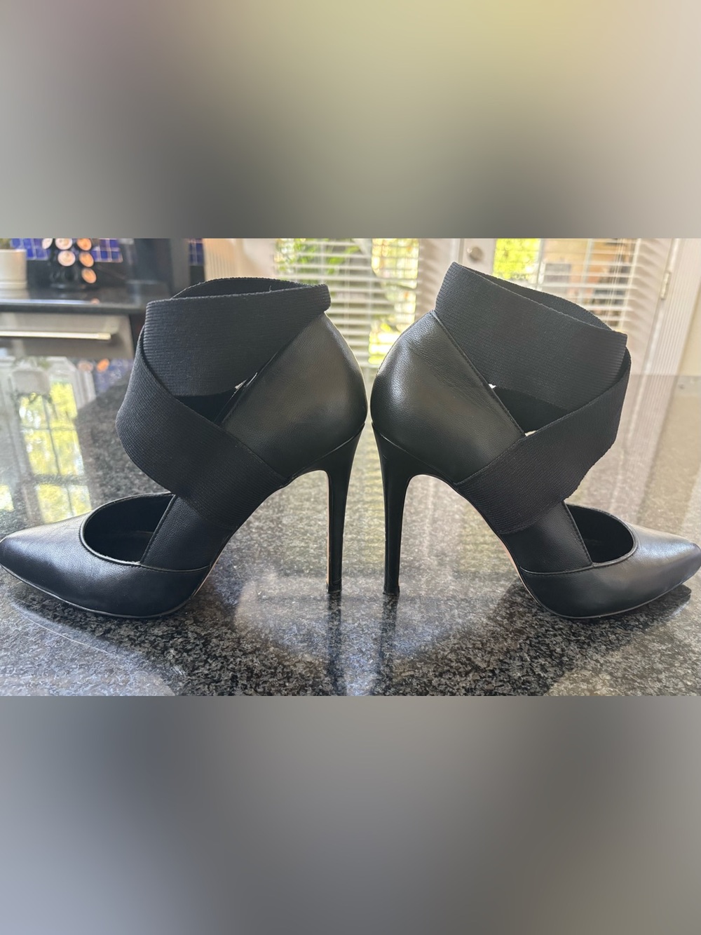 Black Leather Pointed-Toe Stiletto Heels with Crisscross Ankle Straps